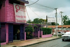 Ixchen, an NGO providing women's health services, promotes affordable mammography and ultrasound with a banner outside Ixchen's center in the outskirts of Managua, Nicaragua.